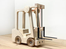 Load image into Gallery viewer, Toy Forklift, Industrial Quality, made from wood and steel, and lifetime durable components.This is a real toy; engaging, realistic, with a simple mechanical device to raise and lower the forks. It is designed with &quot;unbreakable&quot; as a key feature